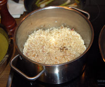 den Reis zugeben und