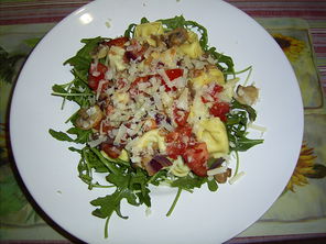 Tortelloni mit Rucola und Champignons